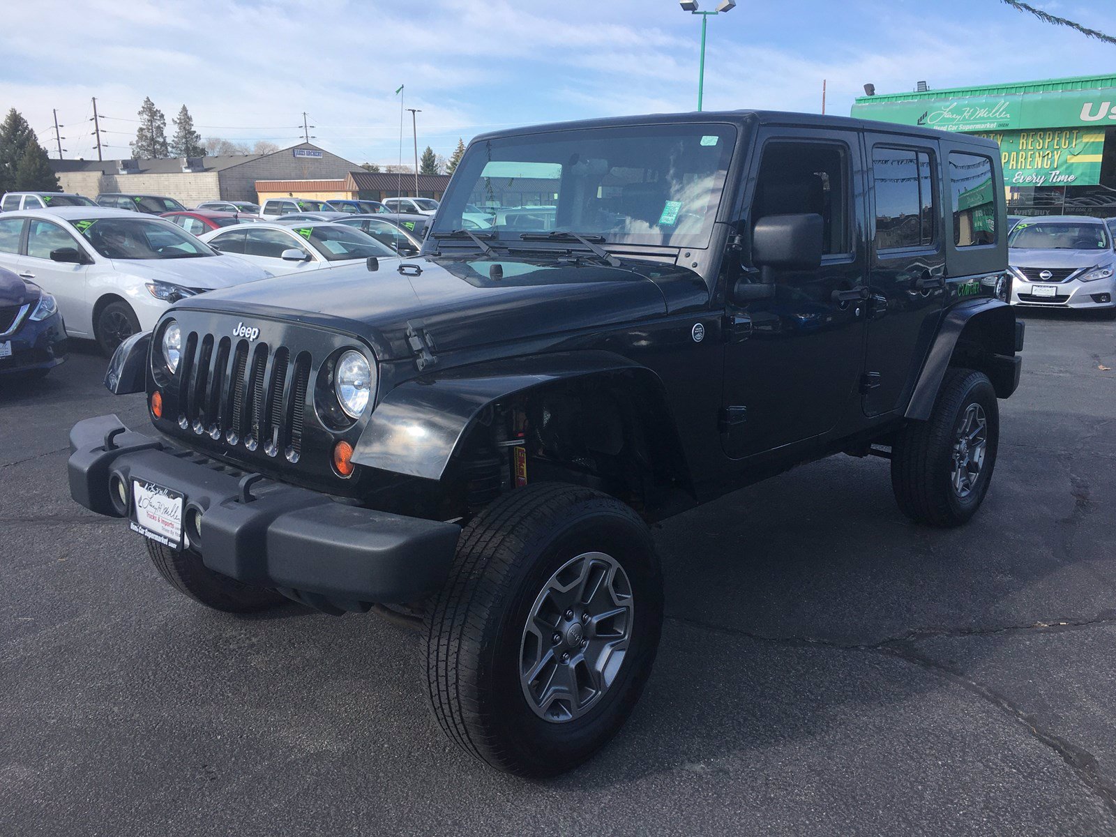 PreOwned 2009 Jeep Wrangler Unlimited Sahara Convertible