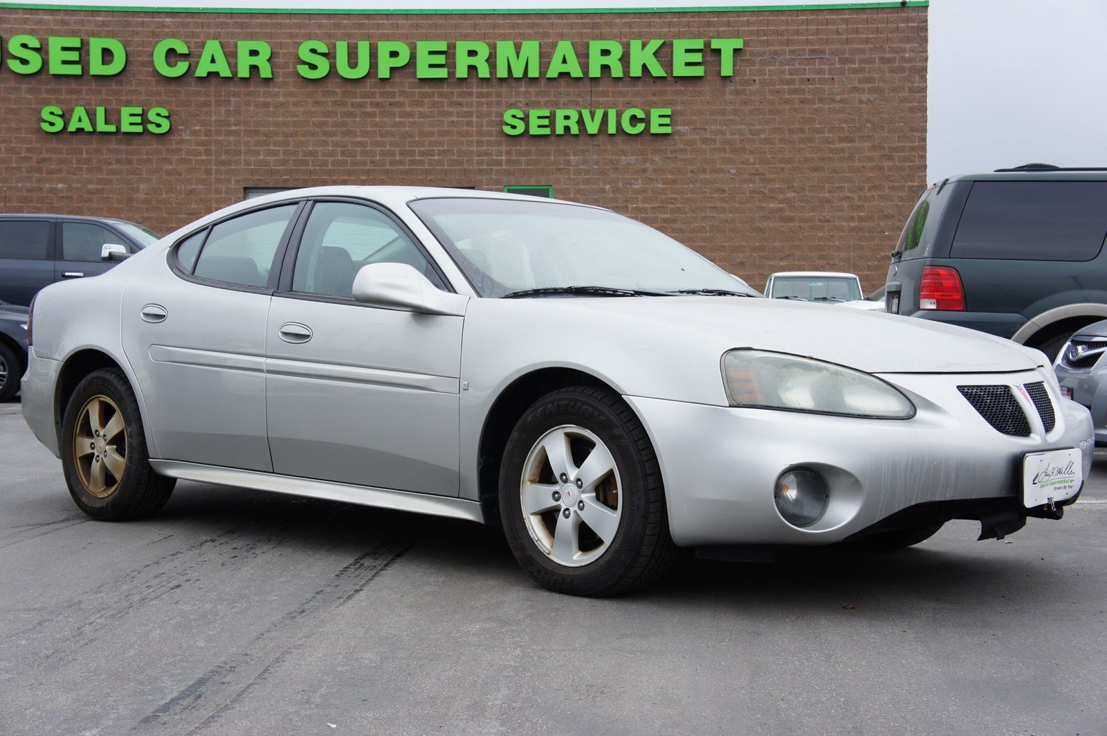 Pre Owned 2007 Pontiac Grand Prix Base 4dr Car In Sandy