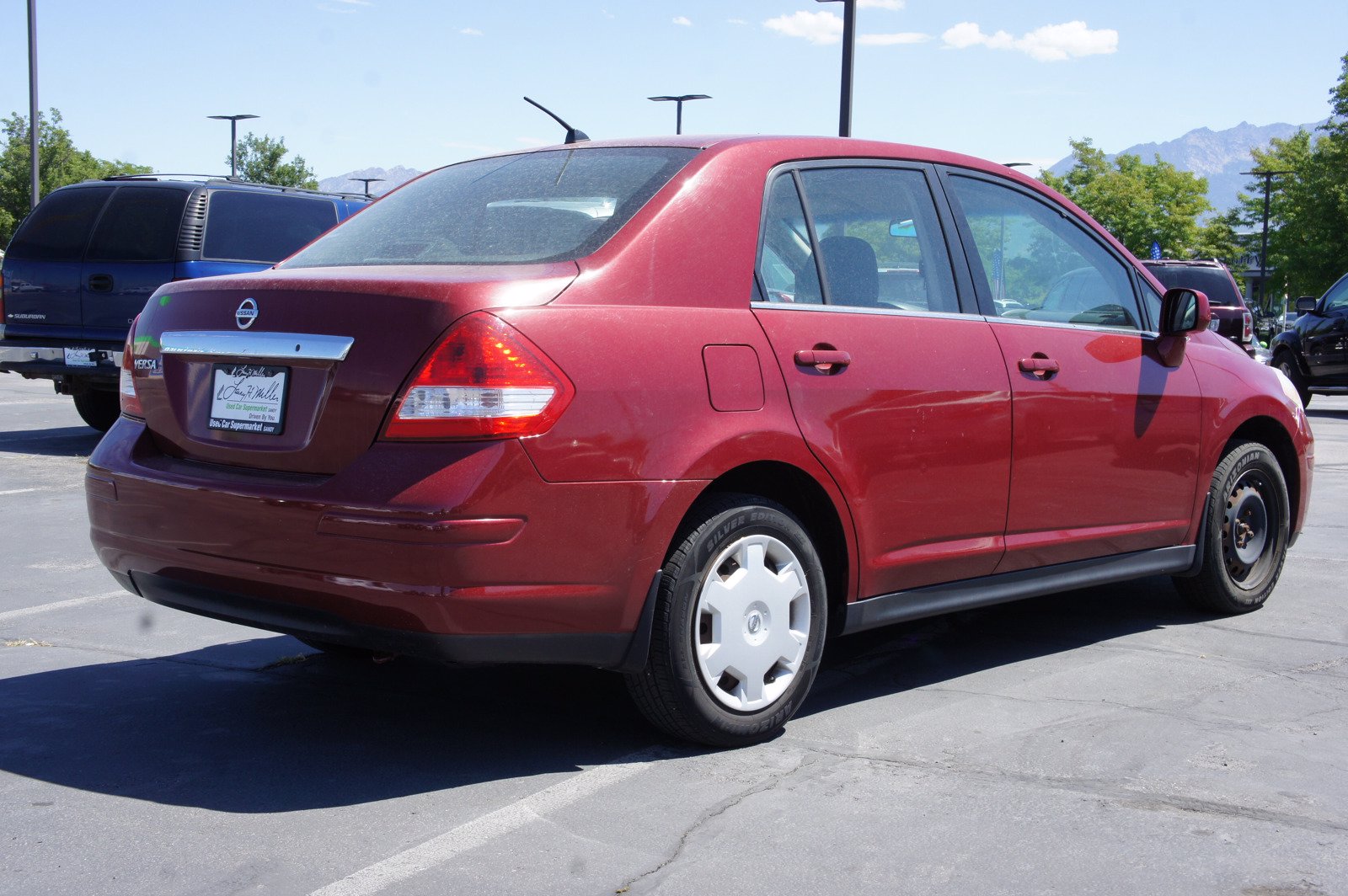PreOwned 2009 Nissan Versa 1.8 S 4dr Car in Sandy S8353D